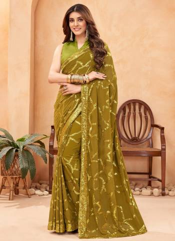 Looking These Fastival Wear Saree in Fine Colored.These Saree Are Faux Georgette And Blouse is Fabricated On Mulburry Silk.Its Beautified With Blooming Color With Heavy Designer Sequance Embroidery Work.