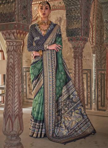 Looking These Fastival Wear Saree in Fine Colored.These Saree And Blouse is Fabricated On Viscose Silk.Its Beautified With Weaving Designer With Rajwadi Printed With Dew Drop Work.