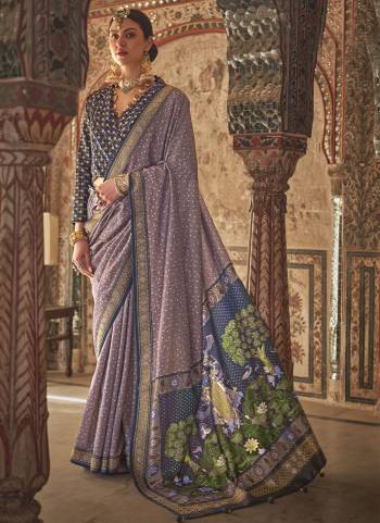 Looking These Fastival Wear Saree in Fine Colored.These Saree And Blouse is Fabricated On Viscose Silk.Its Beautified With Weaving Designer With Rajwadi Printed With Dew Drop Work.