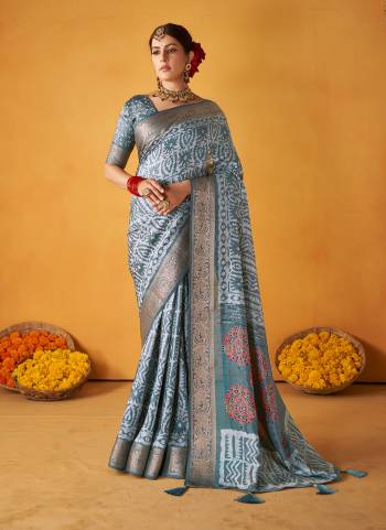 Garb These Party Wear Saree in Fine Colored.These Saree And Blouse is Fabricated On Tussar Silk Pair.Its Beautified With Wevon Designer With Batik Printed.