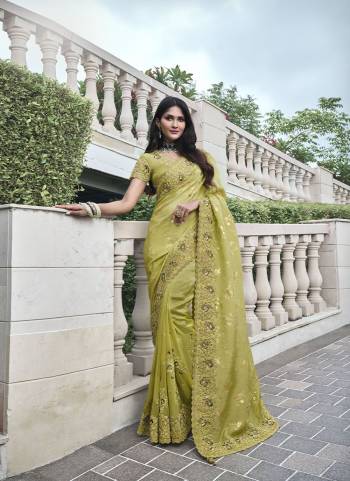 Looking These Fastival Wear Saree in Fine Colored.These Saree Are Tissue Silk And Blouse is Fabricated On Silk.Its Beautified With Designer Mirror,Jari Embroidery With Pearl Stone Work.