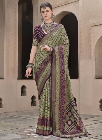 Garb These Fastival Wear Saree in Fine Colored.These Saree And Blouse is Fabricated On Sigma Silk.Its Beautified With Designer Ajrakh Printed With Aqua Finished.