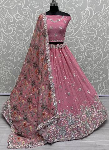 For A Fancy Designer Look,Grab These Lehenga Choli With Dupatta in Fine Colored.These Lehenga And Choli Are Chinon And Dupatta Are Fabricated On Chinon Pair.Its Beautified With Designer Double Sequance,Thread Embroidery Work With Printed Dupatta.