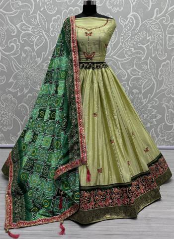 For A Fancy Designer Look,Grab These Lehenga Choli With Dupatta in Fine Colored.These Lehenga And Choli Are Silk And Dupatta Are Fabricated On Georgette Pair.Its Beautified With Designer Double Sequance,Thread Embroidery Work With Printed Dupatta.