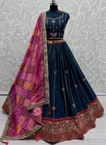 For A Fancy Designer Look,Grab These Lehenga Choli With Dupatta in Fine Colored.These Lehenga And Choli Are Silk And Dupatta Are Fabricated On Georgette Pair.Its Beautified With Designer Double Sequance,Thread Embroidery Work With Printed Dupatta.