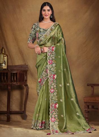 Look Attrective These Designer Party Wear Saree in Fine Colored.These Saree Are Glass Tissue And Blouse Raw Silk is Fabricated.Its Beautified Designer Embroidery Work.