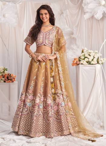 Attrective Looking This Partywear Fine Color Fancy Heavy Designer Choli And Lahenga Fabriced On Tissue And Dupatta Net In Fabricated Beautified With Attrective Designer Heavy Embroidery Work. Buy Now.