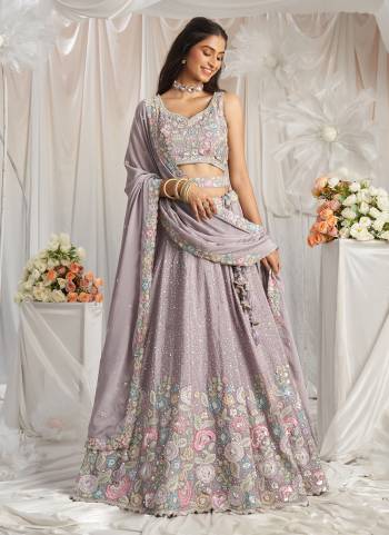 Attrective Looking This Partywear Fine Color Fancy Heavy Designer Choli And Lahenga Fabriced On Chiffon And Dupatta Georgette In Fabricated Beautified With Attrective Designer Heavy Embroidery Work. Buy Now.