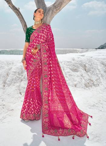 Looking These Traditional Party Wear Saree With 2 Blouse in Fine Colored.These Saree Are Georgette And Coming With 2 Blouse Fabricated On Art Silk.Its Beautified Wevon Designer With Bandhani Patola Printed With Embroidery Work Along With  1 Blouse With Embroidery Work And 1  Plain Rich Blouse.