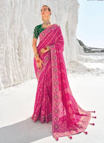 Looking These Traditional Party Wear Saree With 2 Blouse in Fine Colored.These Saree Are Georgette And Coming With 2 Blouse Fabricated On Art Silk.Its Beautified Wevon Designer With Bandhani Patola Printed With Embroidery Work Along With  1 Blouse With Embroidery Work And 1  Plain Rich Blouse.