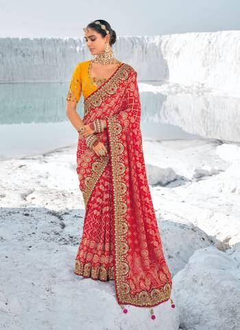 Looking These Traditional Party Wear Saree With 2 Blouse in Fine Colored.These Saree Are Georgette And Coming With 2 Blouse Fabricated On Art Silk.Its Beautified Wevon Designer With Bandhani Patola Printed With Embroidery Work Along With  1 Blouse With Embroidery Work And 1  Plain Rich Blouse.