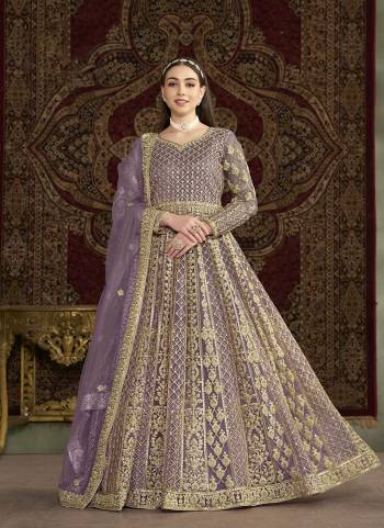 Garb These Beautiful Looking Fine Color Gown With Dupatta.These Gown Are Net And Dupatta Are Net Fabricated.Its Beautified With Designer Heavy Embroidery Work.