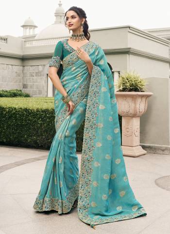 Attrective This Partywear Saree Paired With Blouse.This Saree Are Viscose Tissue And Blouse Are Viscose Tissue Based Fabric With Weaving Jari Designer With Embroidery Work. Buy This Pretty Saree Now.