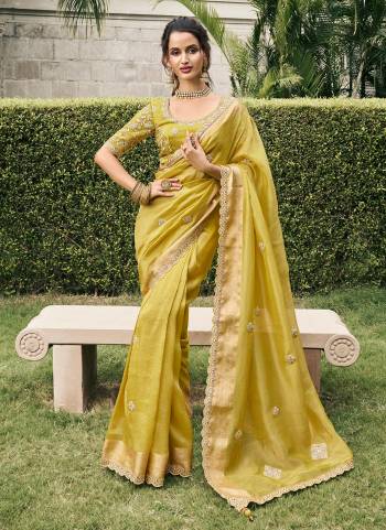 Attrective This Partywear Saree Paired With Blouse.This Saree Are Viscose Tissue And Blouse Are Viscose Tissue Based Fabric With Weaving Jari Designer With Embroidery Work. Buy This Pretty Saree Now.