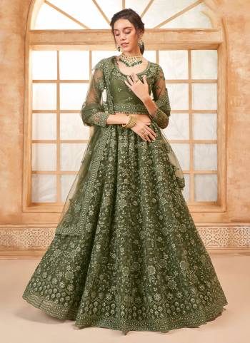 For A Designer Look,Grab These Lehenga Choli in Fine Colored.These Lehenga And Blouse Are Fabricated On Soft Net Pair With Soft Net Dupatta.Its Beautified With Designer Heavy Thread Embroidery With Diamond Work.