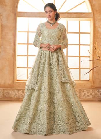 For A Designer Look,Grab These Lehenga Choli in Fine Colored.These Lehenga And Blouse Are Fabricated On Soft Net Pair With Soft Net Dupatta.Its Beautified With Designer Heavy Thread Embroidery With Diamond Work.