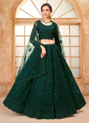 For A Designer Look,Grab These Lehenga Choli in Fine Colored.These Lehenga And Blouse Are Fabricated On Soft Net Pair With Soft Net Dupatta.Its Beautified With Designer Heavy Thread Embroidery With Diamond Work.