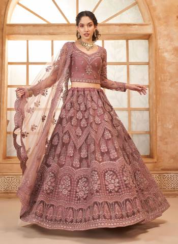 For A Designer Look,Grab These Lehenga Choli in Fine Colored.These Lehenga And Blouse Are Fabricated On Soft Net Pair With Soft Net Dupatta.Its Beautified With Designer Heavy Thread Embroidery With Diamond Work.