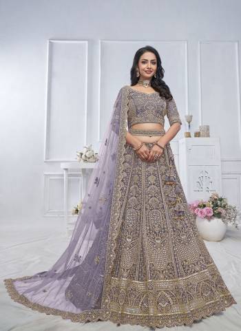 For A Fancy Designer Look,Grab These Lehenga Choli With Dupatta in Fine Colored.These Lehenga And Choli Are Soft Net And Dupatta Are Fabricated On Soft Net Pair.Its Beautified With Heavy Designer Jari,Sequance Embroidery,Stone Work.