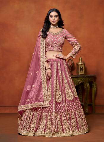 For A Designer Look,Grab These Lehenga Choli in Fine Colored.These Lehenga And Blouse Are Fabricated On Net Pair With Net Dupatta.Its Beautified With Designer Embroidery Work.