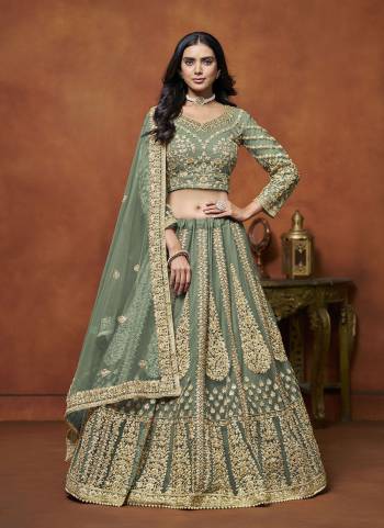 For A Designer Look,Grab These Lehenga Choli in Fine Colored.These Lehenga And Blouse Are Fabricated On Net Pair With Net Dupatta.Its Beautified With Designer Embroidery Work.