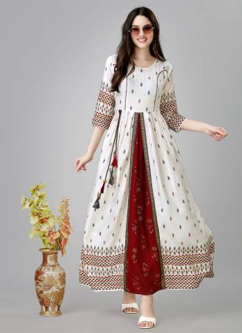 Attrective These Beautiful Looking Readymade Long Kurti.These Kurti is Fabricated On Rayon.Its Beautified With Designer Printed With Hand Work .