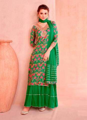 Attrective These Party Wear Free Size Stitched Gharara Atteched Suit in Fine Colored Pair With Dupatta.These Top Are Muslin And Dupatta Are Nazmin And Pair With Santoon Inner.Its Beautified With Designer Digital Printed With Hand Work.