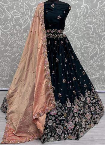 For A Fancy Designer Look,Grab These Lehenga Choli With Dupatta in Fine Colored.These Lehenga And Choli Are Silk And Dupatta Are Fabricated On Chinon Pair.Its Beautified With Designer Double Sequance,Thread Embroidery Work.