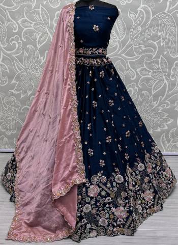 For A Fancy Designer Look,Grab These Lehenga Choli With Dupatta in Fine Colored.These Lehenga And Choli Are Silk And Dupatta Are Fabricated On Chinon Pair.Its Beautified With Designer Double Sequance,Thread Embroidery Work.