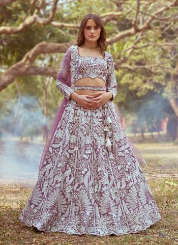 Attrective Looking This Partywear Fine Color Fancy Heavy Designer Choli And Lahenga Fabriced On Satin And Dupatta Net In Fabricated Beautified With Attrective Designer Heavy Embroidery Work. Buy Now.