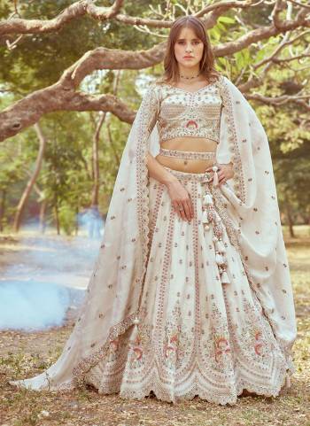 Attrective Looking This Partywear Fine Color Fancy Heavy Designer Choli And Lahenga Fabriced On Tissue And Dupatta Tissue In Fabricated Beautified With Attrective Designer Heavy Embroidery Work. Buy Now.