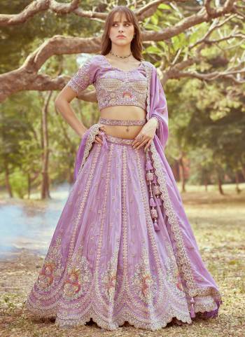 Attrective Looking This Partywear Fine Color Fancy Heavy Designer Choli And Lahenga Fabriced On Tissue And Dupatta Tissue In Fabricated Beautified With Attrective Designer Heavy Embroidery Work. Buy Now.