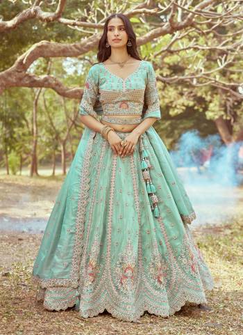 Attrective Looking This Partywear Fine Color Fancy Heavy Designer Choli And Lahenga Fabriced On Tissue And Dupatta Tissue In Fabricated Beautified With Attrective Designer Heavy Embroidery Work. Buy Now.