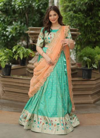 For A Designer Look,Grab These Lehenga Choli in Fine Colored.These Lehenga And Blouse Are Fabricated On Cosmos Jacquard Pair With Russion Silk Dupatta.Its Beautified With Wevon Meenakari Designer,Embroidery Work.