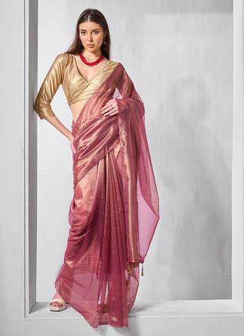 Garb These Fancy Saree in Fine Colored.These Saree Are Gold Tissue Net And Blouse is Fabricated On Art Silk Pair.Its Beautified With Solid,Gold Cotted Work.