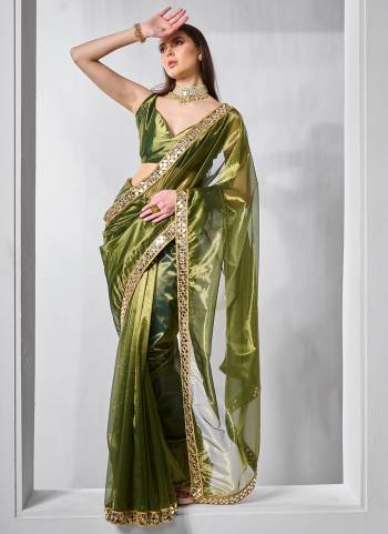 Garb These Fancy Saree in Fine Colored.These Saree Are Gold Tissue Net And Blouse is Fabricated On Art Silk Pair.Its Beautified With Solid,Gold Cotted Work.