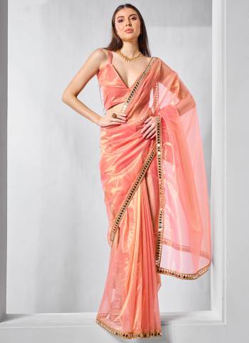 Garb These Fancy Saree in Fine Colored.These Saree Are Gold Tissue Net And Blouse is Fabricated On Art Silk Pair.Its Beautified With Solid,Gold Cotted Work.