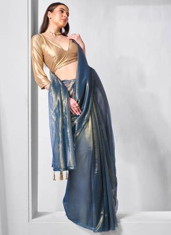 Garb These Fancy Saree in Fine Colored.These Saree Are Gold Tissue Net And Blouse is Fabricated On Art Silk Pair.Its Beautified With Solid,Gold Cotted Work.