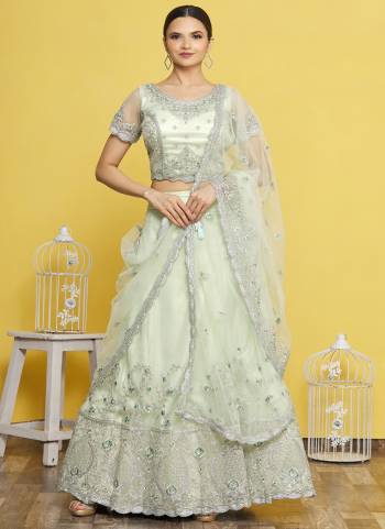 A Designer Look,Grab These  Lehenga Choli in Fine Colored.These Lehenga And Blouse Are Satin And Dupatta Are Fabricated On Net.Its Beautified With Designer Embroidery Work.