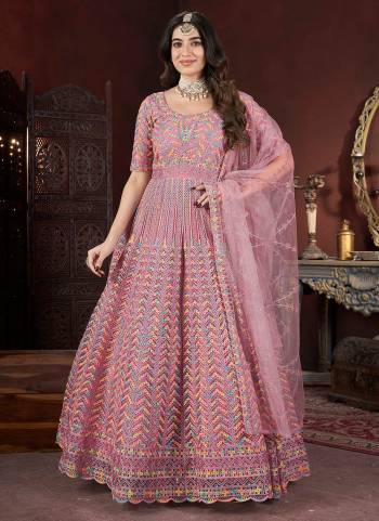 Attrective Looking These Beautiful Looking Readymade Gown With Dupatta.These Gown And Dupatta is Fabricated On Net.Its Beautified With Designer Embroidery With Zarkan Work.