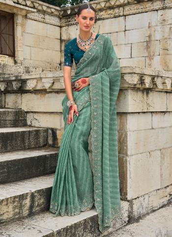 Looking These Traditional Party Wear Saree With Blouse in Fine Colored.These Saree Are Tissue Crush With Blouse Fabricated On Russion Silk.Its Beautified Heavy Designer Hand Work.