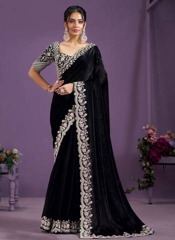 Look Attrective These Designer Party Wear Saree in Fine Colored.These Saree Are Two Tone Satin Silk And Blouse Japan Satin Silk is Fabricated.Its Beautified Heavy Desiger Embroidery Hand Work.