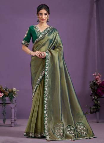 Look Attrective These Designer Party Wear Saree in Fine Colored.These Saree Are Glass Tissue And Blouse Malai Satin Silk is Fabricated.Its Beautified Heavy Desiger Embroidery Patch Work.