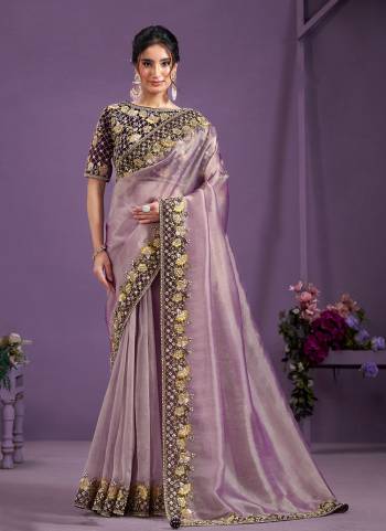 Look Attrective These Designer Party Wear Saree in Fine Colored.These Saree Are Glass Tissue And Blouse Malai Satin Silk is Fabricated.Its Beautified Heavy Desiger Embroidery Moti Work.