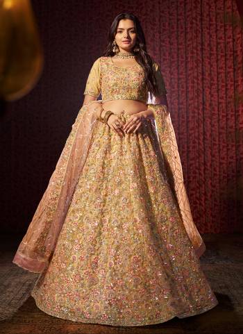 For A Designer Look,Grab These Lehenga Choli in Fine Colored.These Lehenga And Blouse Are Fabricated On Net Pair With Soft Net Dupatta.Its Beautified With Designer Dori,Sequance Embroidery Work.