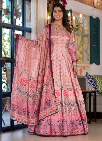 Garb These Designer Gown in Fine Colored Pair With Dupatta.These Gown Are Fabricated On Dola Silk Pair With Chinon Dupatta.Its Beautified With Designer Digital Printed With Hand Work.