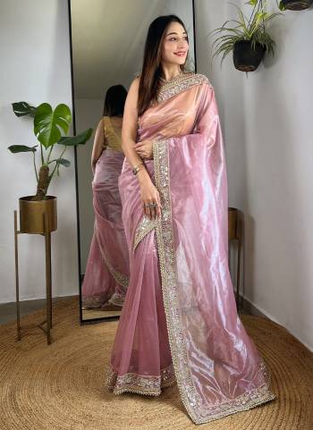 Garb These Party Wear Saree in Fine Colored.These Saree Are Silver Tissue Silk And Blouse is Silver Tissue Silk Fabricated.Its Beautified With Designer Sequance,Jari,Real Mirror Embroidery Work.