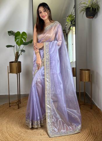 Garb These Party Wear Saree in Fine Colored.These Saree Are Silver Tissue Silk And Blouse is Silver Tissue Silk Fabricated.Its Beautified With Designer Sequance,Jari,Real Mirror Embroidery Work.