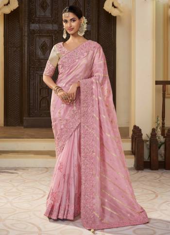 Attrective This Partywear Saree Paired With Blouse.This Saree Are Viscose Tissue And Blouse Are Banarasi Silk Based Fabric With Weaving Jari Designer With Embroidery Work. Buy This Pretty Saree Now.