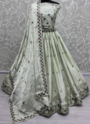 For A Fancy Designer Look,Grab These Lehenga Choli With Dupatta in Fine Colored.These Lehenga And Choli Are Silk And Dupatta Are Fabricated On Chinon Pair.Its Beautified With Designer Double Sequance,Thread Embroidery Work.